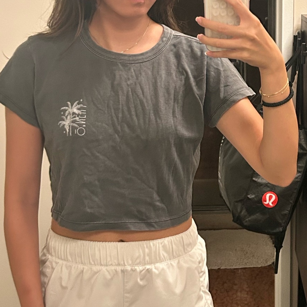 Gray O'Neill surf crop top with white palm tree graphic, size L (fits S)